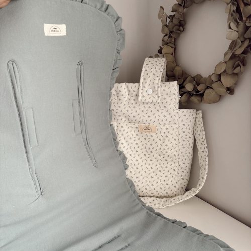 Colchoneta verde con volantitos